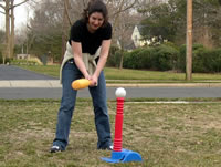 Mom takes a swing.