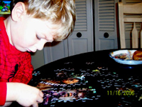 Tommy works the puzzle!