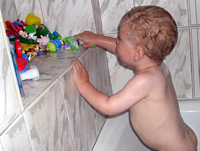 Nicholas loves his bath toys