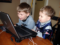 Some day Nicholas will get his turn at the computer.