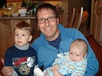 Nicholas with Jeff and brand new cousin Tennison.