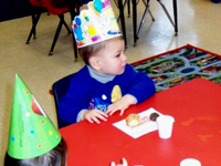 Nicholas shares at school.