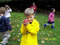 Tommy on a field trip to an apple farm.
