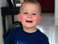 Nicholas beams.