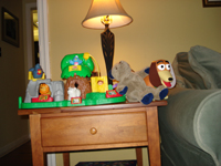 Tommy takes a picture of some toys.