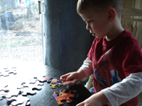 Nicholas tackles a puzzle.