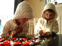 Tommy and Nicholas tackle a puzzle.