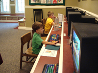 Tommy and Nick at the library computers.