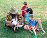 Todd reads a story in a Ridgewood park.