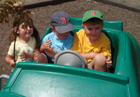 Ophelia, Nicholas and Tommy take a spin around the park.