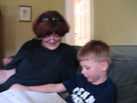 Tommy reads his "Tommy Can Read" book!