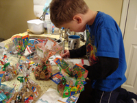 Tommy prepares gifts for his teachers.