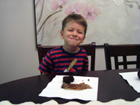 Nicholas enjoying breakfast.