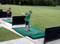 The boys on the driving range.