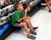 Watching a movie on 20 TVs at WalMart.