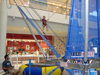 Nicholas bounces to the second floor.
