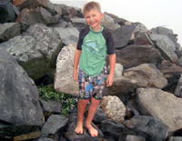 Tommy on the rocks on the Maine coast.