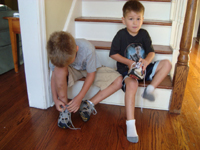 Tying laces for school.
