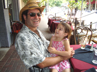 Todd and daughter O'Rosie have lunch outside in Roswell.