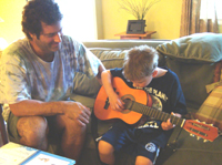 Todd teaches Tommy a few tunes.