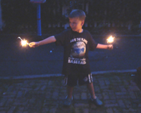 Tommy wields the sparklers.