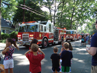Firemen throw out candy.