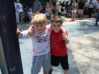 Tommy meets up with friend Kevin at Disney.