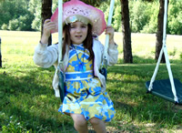 Ophelia on her birthday swing set.