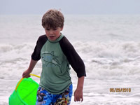 Tommy in the surf.