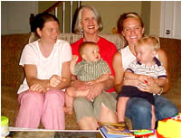 Flanagan, two daughters and two grandsons. Caleb and William