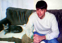 Mikey cat-sits at home!