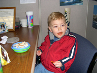 Tommy has lunch with Grandma at work.
