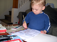 Tommy likes to water color.