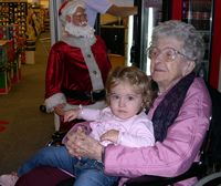 Victoria in great-grandma's stroller!