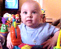 Tommy in his saucer!