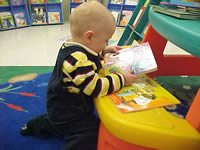 Reading a book.