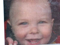 Smiling through the screen.