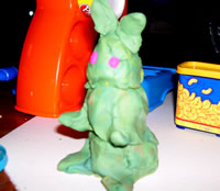 Tommy makes Play Doh snowmen and bunnies waitng for Nicholas to come home!